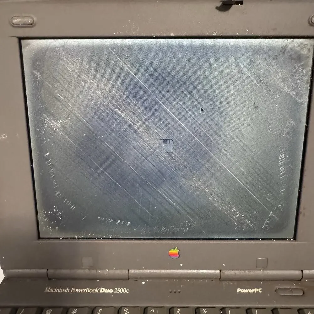 Vintage Apple Macintosh PowerBook Duo 2300c PowerPC Laptop Powers On AC Adapter